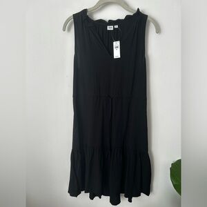 Gap. NWT. Black tiered sleeveless dress with tie waist. Size XS.